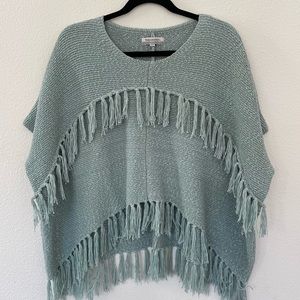 Boho, sea foam colored knit poncho. Super cute!